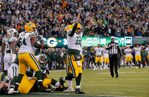 Green Bay Packers - Aarson Rodgers celebrates touchdown