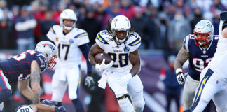Melvin Gordon runs with the football during the AFC Divisional Playoff Game