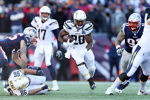 Melvin Gordon runs with the football during the AFC Divisional Playoff Game