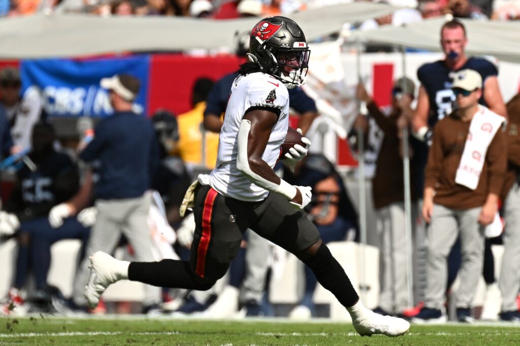 Nov 12, 2023; Tampa, Florida, USA; Tampa Bay Buccaneers running back Rachaad White (1) scores a touchdown in the first half against the Tennessee Titans at Raymond James Stadium. Mandatory Credit: Jonathan Dyer-USA TODAY Sports