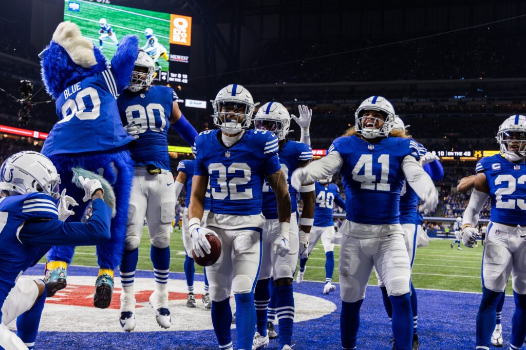 Dec 16, 2023; Indianapolis, Indiana, USA; Indianapolis Colts safety Julian Blackmon (32) celebrates his interception with teammates in the second half against the Pittsburgh Steelers at Lucas Oil Stadium. Mandatory Credit: Trevor Ruszkowski-USA TODAY Sports