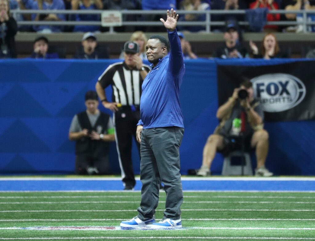 Former Detroit Lions running back Barry Sanders is acknowledged by Lions fans and the team during a stoppage in the game against the Seattle Seahawks at Ford Field, Sunday, Sept. 17, 2023. A day before, the Lions unveiled a statue of Sanders outside the stadium.