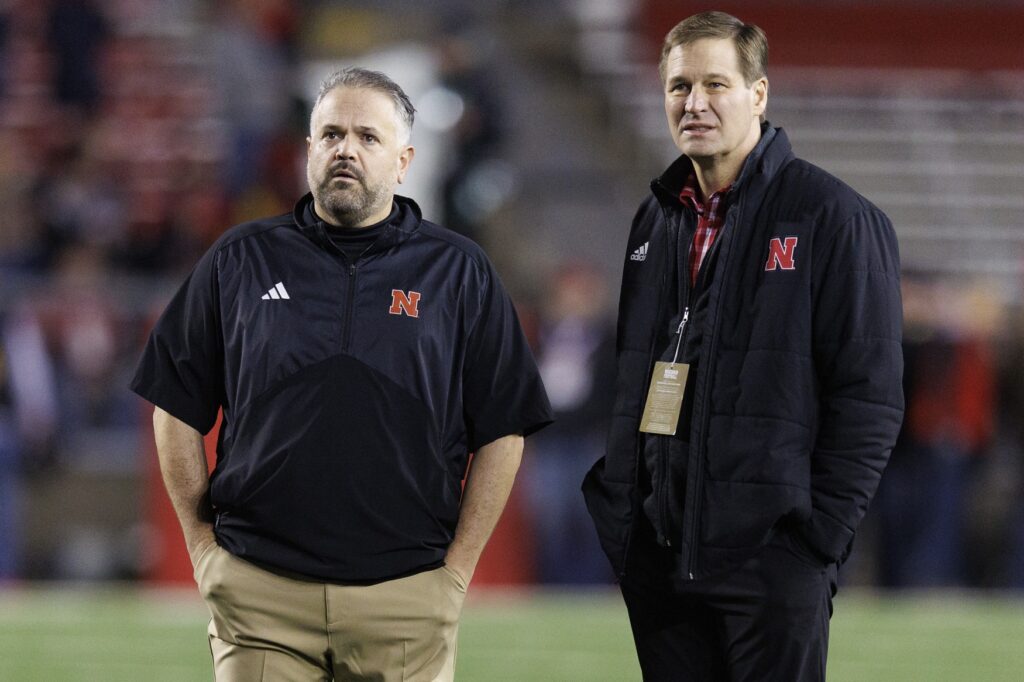 Nebraska Cornhuskers head coach Matt Rhule stands with Nebraska athletic director Trev Alberts during warmups prior to the game against the Wisconsin Badgers at Camp Randall Stadium.