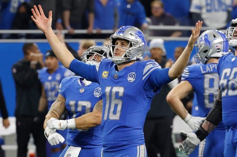 Detroit Lions quarterback Jared Goff (16) raises his arms as the Lions beat the L.A. Rams, 24-23 in the wild-card round of the NFC playoffs at Ford Field in Detroit on Sunday, January 14, 2023.