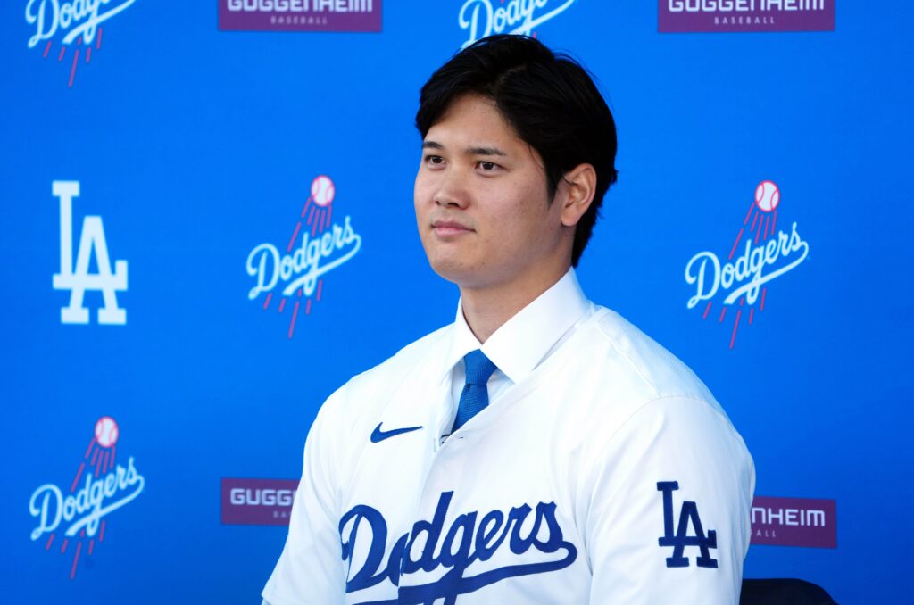 Los Angeles Dodgers player Shohei Ohtani is introduced at a press conference at Dodger Stadium.