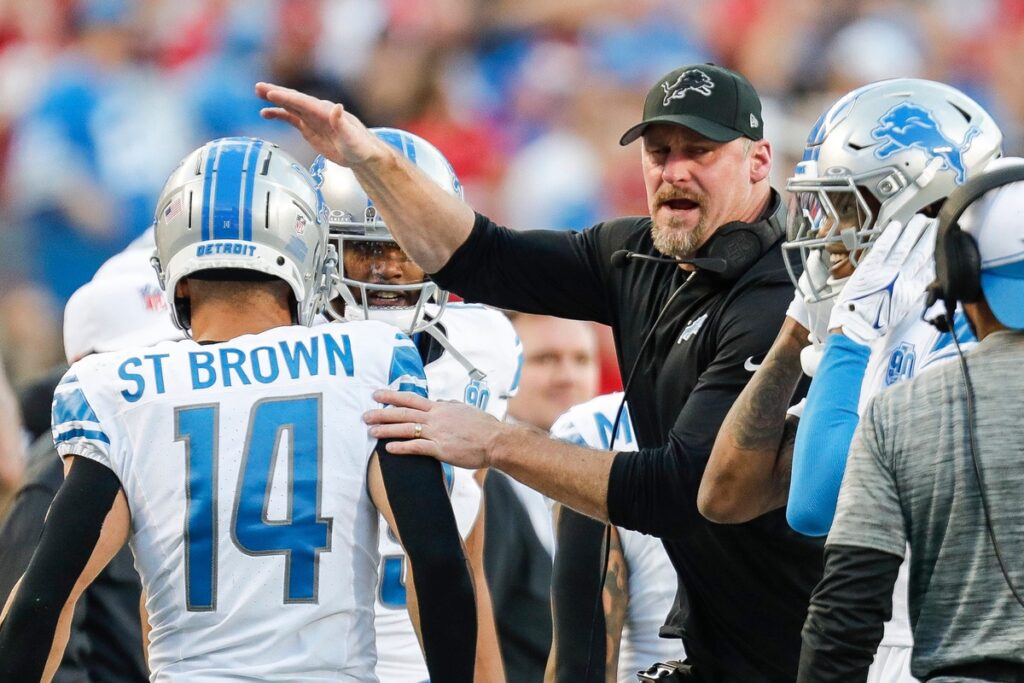 Detroit Lions head coach Dan Campbell celebrates a touchdown with wide receiver Amon-Ra St Brown in the NFC Championship in Santa Clara, California against the San Francisco 49ers.
