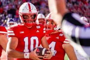Nebraska Cornhuskers quarterback Heinrich Haarberg (10) and tight end Luke Lindenmeyer (44) celebrate after a touchdown by Haarberg against the Northwestern Wildcats during the second quarter at Memorial Stadium. 