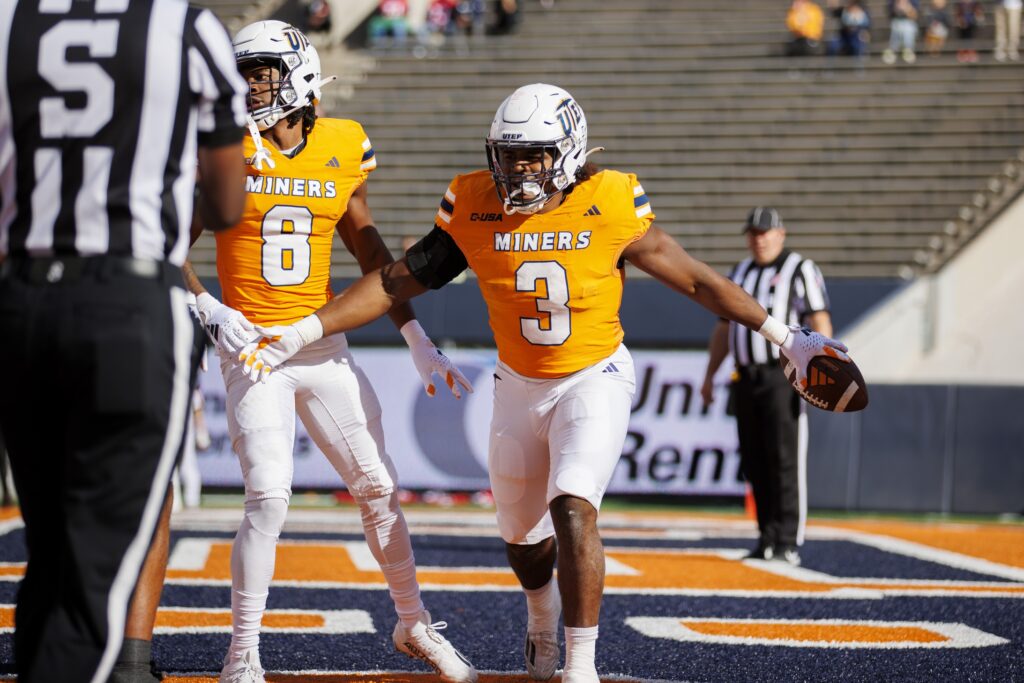 UTEP Miners running back Deion Hankins (3) celebrates after scoring against No. 22 Liberty Flames during the first half at Sun Bowl Stadium.