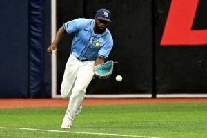 Tampa Bay Rays left fielder Randy Arozarena (56) fields the ball in the second inning against the Kansas City Royals at Tropicana Field. 