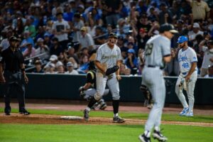 Wake Forest outfielder Nick Kurtz (8) celebrates after strikeout in the sixth inning against the North Carolina Tar Heels during the ACC Baseball Tournament at Truist Field.