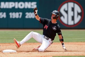 Georgia's Charlie Condon (24) slides into second base during a NCAA Athens Regional baseball game against Army in Athens, Ga., on Friday, May 31, 2024. Georgia won 8-7.