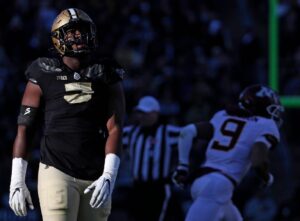 Purdue Boilermakers linebacker Nic Scourton (5) watches a replay on the scoreboard during the NCAA football game against the Minnesota Golden Gophers, Saturday, Nov. 11, 2023, at Ross-Ade Stadium in West Lafayette, Ind. Purdue Boilermakers won 49-30. Photo by Alex Martin/Journal and Courier / USA TODAY NETWORK