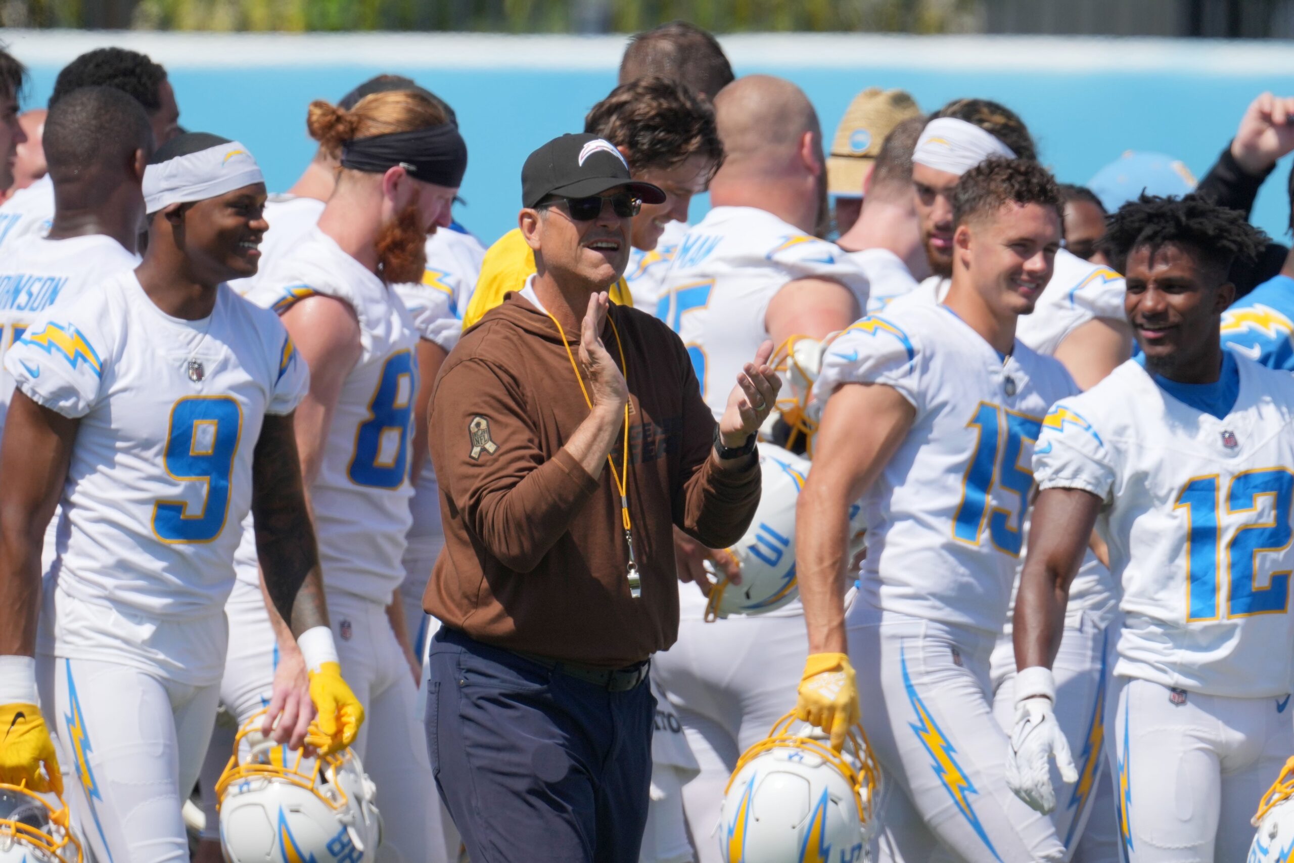Los Angeles Chargers head coach Jim Harbaugh interacts with his team during minicamp at the Hoag Performance Center.