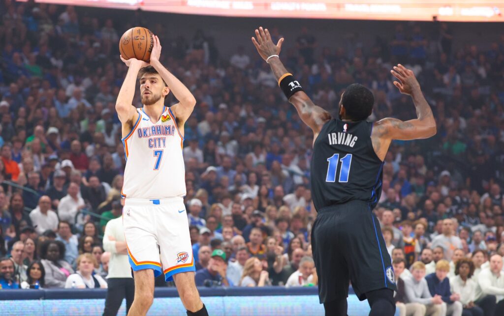 Oklahoma City Thunder forward Chet Holmgren (7) shoots as Dallas Mavericks guard Kyrie Irving (11) defends during the first quarter in game six of the second round of the 2024 NBA playoffs at American Airlines Center.