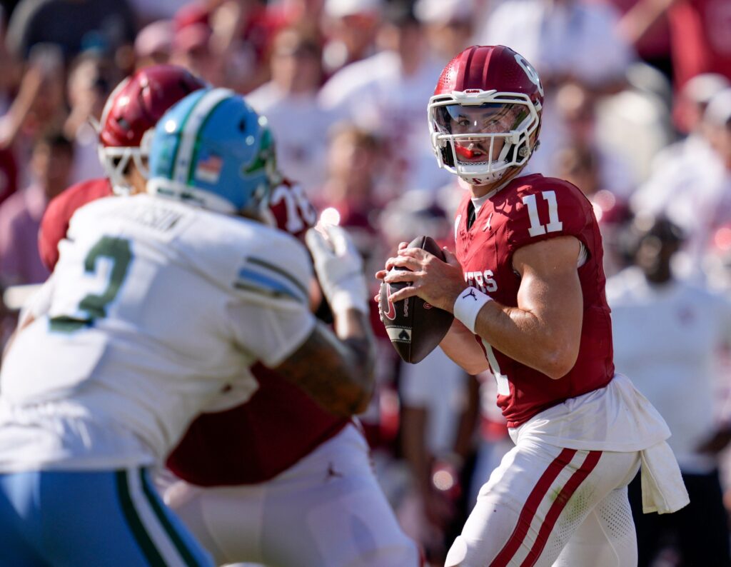 Oklahoma Sooners quarterback Jackson Arnold (11) drops back to pass during a college football game between the University of Oklahoma Sooners (OU) and the Tulane Green Wave at Gaylord Family.