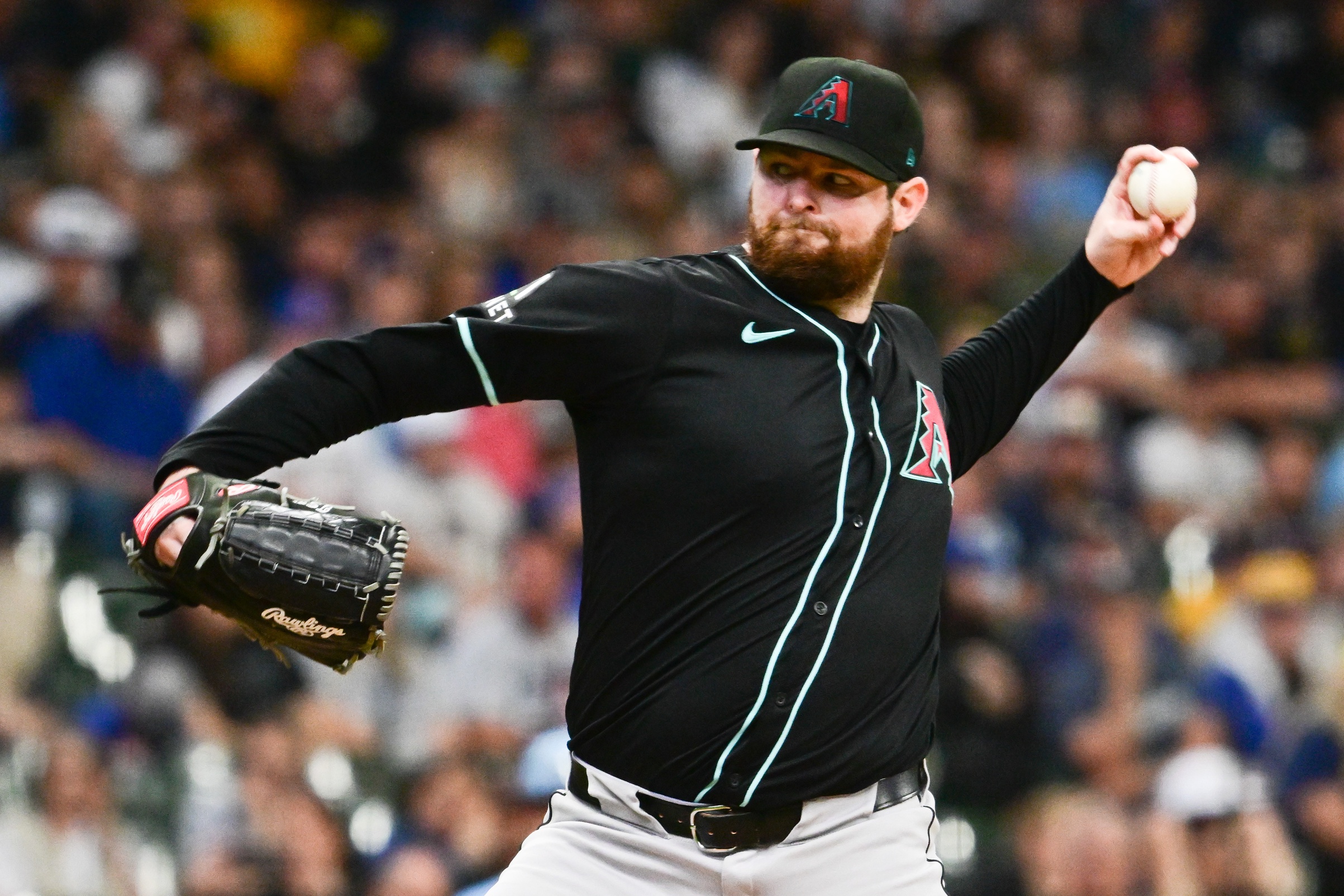 Arizona Diamondbacks starting pitcher Jordan Montgomery (52) pitches in the first inning against the Milwaukee Brewers at American Family Field.