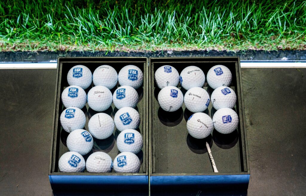 Golf balls at the tee at the SoFi Center, the home of TGL, the interactive golf league founded by Tiger Woods and Rory McIlroy on December 18, 2024, in Palm Beach Gardens, Florida.