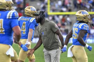Home 11 UCLA Bruins head coach Deshaun Foster on the sideline